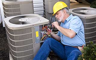 Person Working on AC Unit